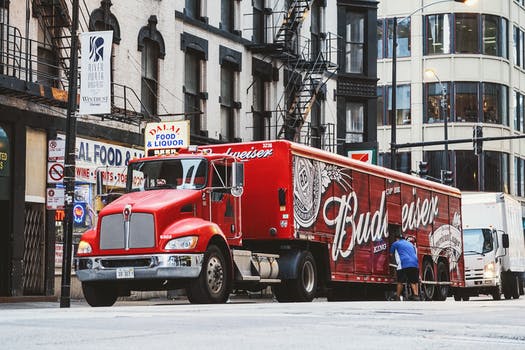 Red budweiser trailer truck