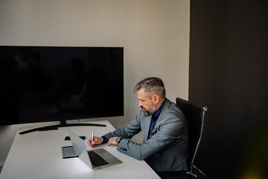 A man taking down notes