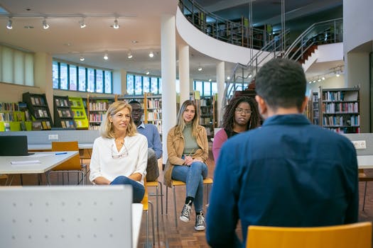 Multiethnic students and teacher listening report of student