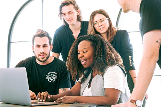 Woman sharing her presentation with her colleagues