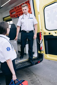 Paramedics working as ambulance medical personnel