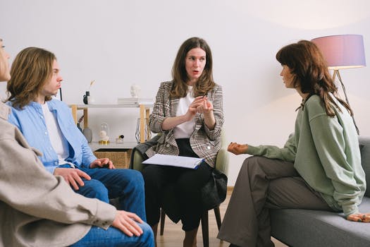 Psychotherapist telling advice to group of patients