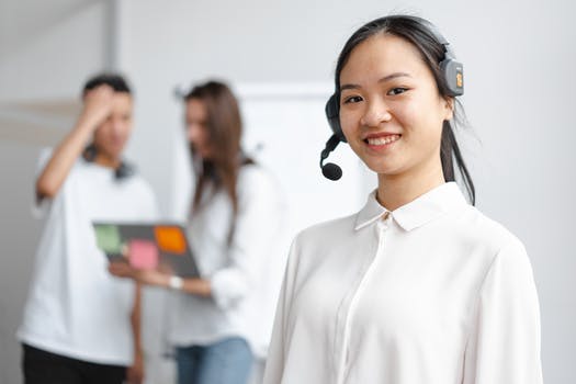 Shallow focus photo of smiling woman wearing headphones