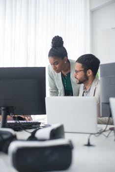 Colleagues at work having a discussion