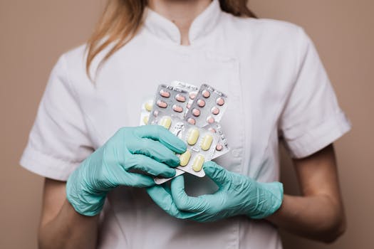 Person holding medicines 