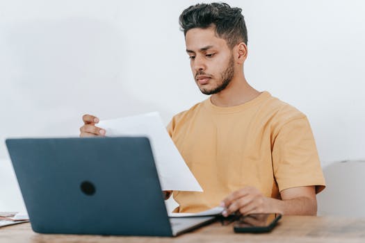 Student with notebook doing homework 