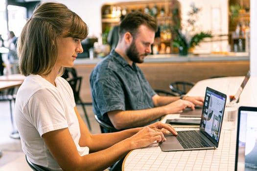 Photo of woman using laptop