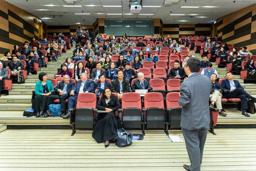 Man standing in front of people