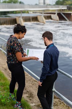 Female engineer planning dam