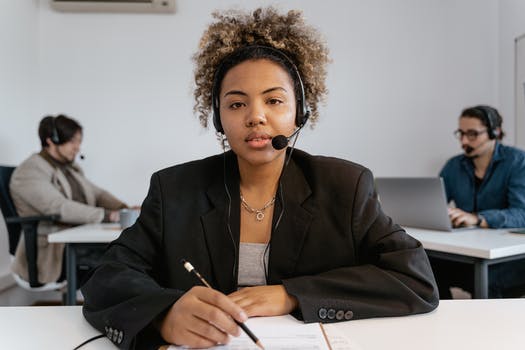 A woman wearing a headset