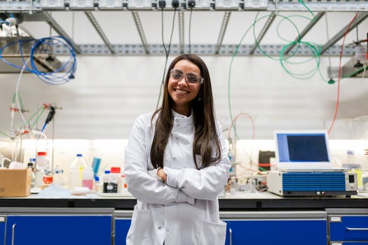 Photo of female engineer wearing lab coat