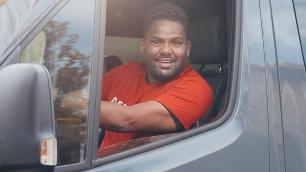 A man driving a car